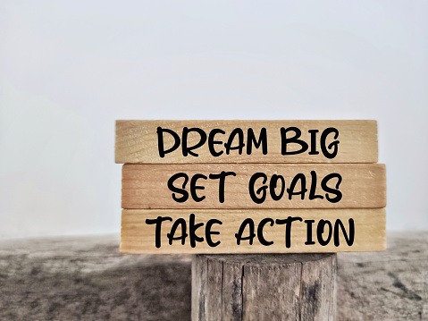 Dream Big Set Goals Take Action Text Background. Stock Photo.